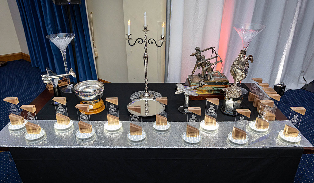 A table laden with trophies, which were subsequently awarded to honour those who embody the ethos of “Agility, Readiness, and Resolve”.